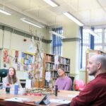 Ruben Whitter works with a group in Stirchley Library to make a Community poem
